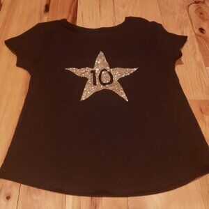 size 7/8 shirt with "10"